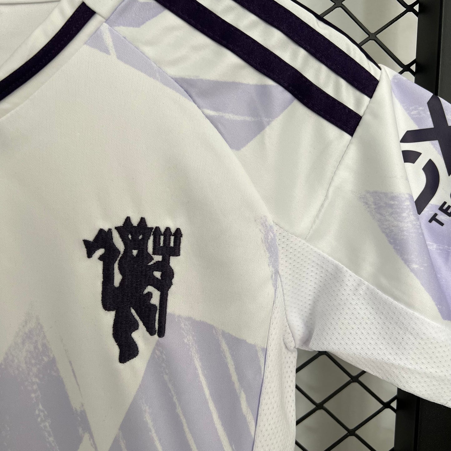 Kit Niño Manchester United Visita 25/26